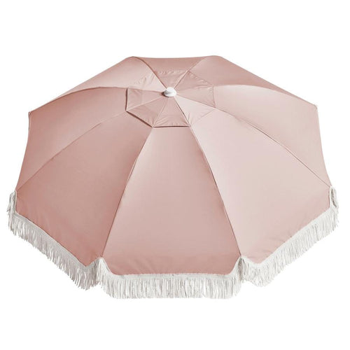 Whether you're headed to the beach or enjoying a picnic in the park, the Basil Bangs Premium Beach Umbrella Nudie is the perfect companion.