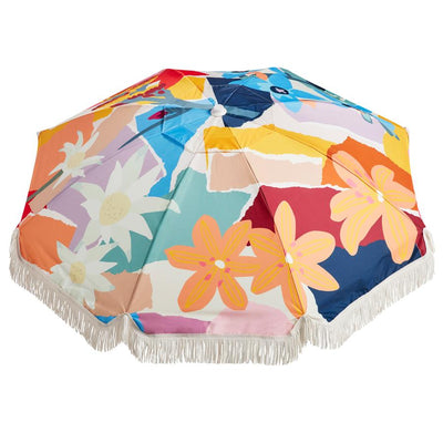 Stay protected from the sun's harmful rays while enjoying the outdoors with the Basil Bangs Premium Beach Umbrella Wildflowers.