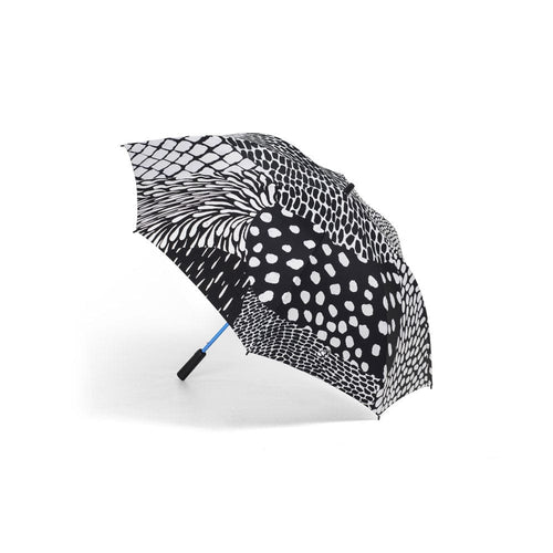 Stay dry in style with the Basil Bangs Rain Caddy Umbrella - a large golf-style umbrella with colorful prints and premium features.