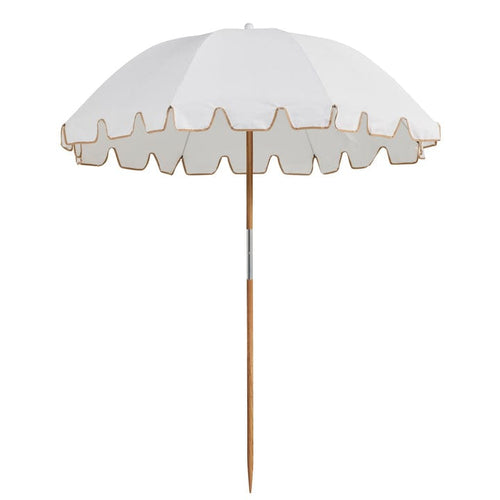 Whether you're headed to the beach or simply relaxing in the backyard, the Basil Bangs Weekend Umbrella Salt has got you covered. With its UPF50+ protection and durable canvas construction, it's the perfect choice for any adventure.